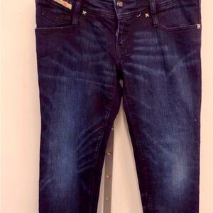Diesel straight leg skinny jeans . Dark wash with black detail . 30x30 Like new